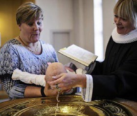 Barnedåb i dansk kirke.